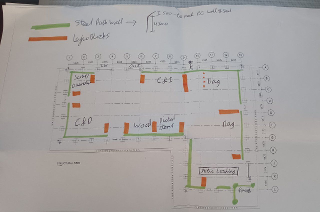 Client's hand-marked site plan with coloured lines showing where block walls were wanted